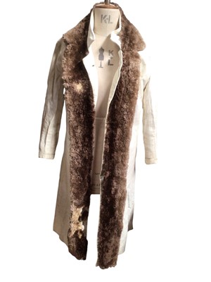 Lot 2520 - 1950s Christian Dior Automne Hiver 1957 white leather coat with fur trim. In need of renovation.