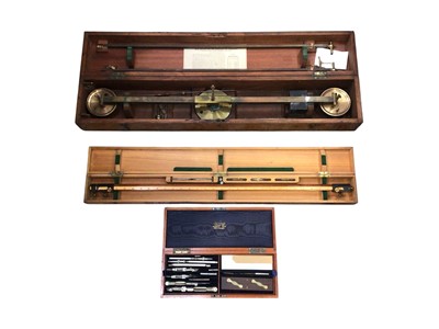 Lot 2960 - A fine set of drawing instruments by J. Coombes in a mahogany box, together with an antique eidograph and an antique measuring instrument