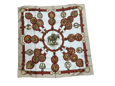 Lot 2537 - Hermès 'Cuiveeries' silk scarf by F. de La Perriere 90 x 90cms approximately.