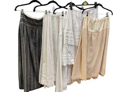 Lot 2541 - Lots of Victorian / Edwardian black skirts and woollen underskirts.