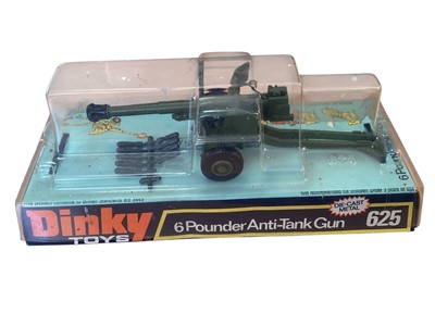 Lot 1708 - Dinky Toys diecast 6 Pounder Anti-Tank Gun, on plinth with bubble pack No.625 and Climax Conveyancer Fork Lift Truck, in window box No.404 (2)