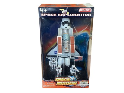 Lot 1710 - Action Products Space Voyagers Saturn V (1967-1975) Collectors Series 1999, with Apollo II patch, in original packaging and Realtoy Space Exploration Series 4-piece Space Mission playset, boxed...