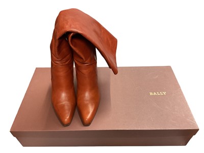 Lot 2586 - Bally knee-high leather boots, black pair size 37, brown pair size 37 1/2. ..