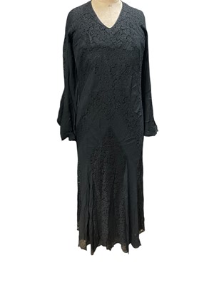 Lot 2545 - 1930s black silk crepe and lace evening gown with bell sleeves, sold with black silk long slip.