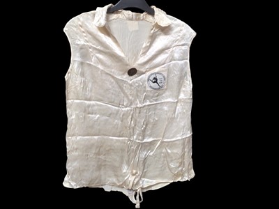 Lot 2548 - 1930s Women's League of Health and Beauty official cream satin top with embroidered badge and metal badge. Scarce item.