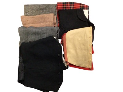 Lot 2550 - Men's waistcoats including wool work waistcoats, chamois leather etc. Plus a pair of vintage side button riding breeches.