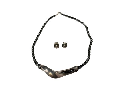 Lot 33 - Georg Jensen Danish silver and hematite bead necklace, together with a pair of Georg Jensen silver circular stud earrings, no.8