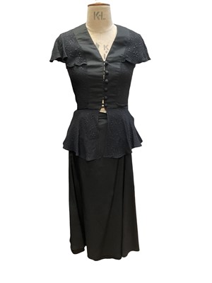 Lot 2554 - 1970s Etam black peplum top and skirt, 1970s green python jacket, a Jaeger knitted cardigan, size 12 leather bomber jacket, kid gloves, and a Burmese white metal purse