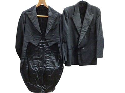 Lot 2561 - Men's vintage black tailcoats and evening trousers plus some as new wool waistcoats plus a maroon damask dressing gown.