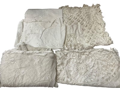 Lot 2567 - Vintage embroidered net lace curtain, ungathered width 210cm, drop 210cmcapproximately, selection of worked tablecloths including tape and needlerun lace, cut-outwork etc. In two boxes.