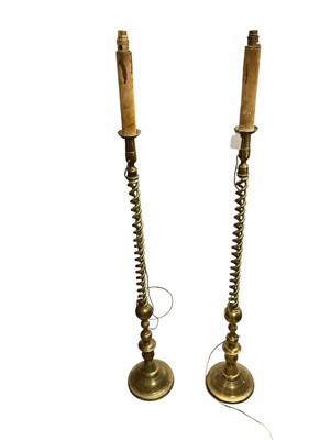 Lot 1447 - Pair of brass altar candlesticks converted to lamps