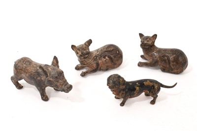 Lot 701 - Bronze cold painted dachshund and three other cold painted metal animals (4)