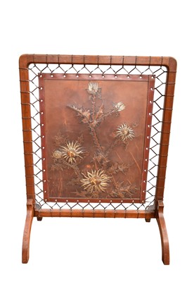 Lot 5300 - Late Victorian Aesthetic Movement fire screen with embossed and gilded leather panel
