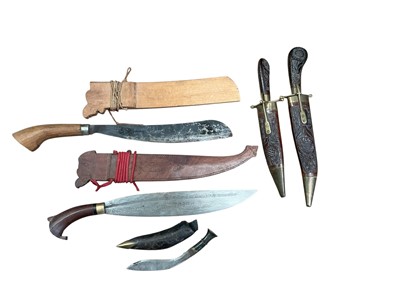 Lot 905 - Group of eastern knives to include a Gurkha Kukri and a Barong.