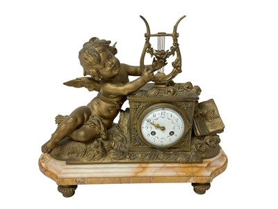 Lot 661 - Late 19th / early 20th century Continental mantel clock, with key and pendulum