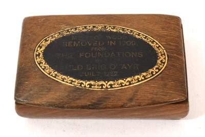 Lot 709 - Edwardian Mauchline Ware snuff box with oval plaque "Made of wood removed in 1909 from the foundations of Auld Brig O' Ayr built in 1252", probably made by John Lyall, 6.3cm in length.
