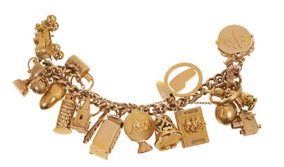 Lot 473 - 9ct gold charm bracelet
