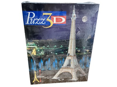 Lot 1905 - Selection of Jigsaw Puzzles including Puzz3D Eiffel Tower 102cm high, Unique Working 3-D Windmill 30" high, Highland Cattle 1000 pieces, Waddington's Maps (x6) and Marquetry Craft Kit "Puffins...