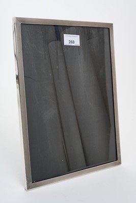 Lot 268 - Large Elizabeth II silver photograph frame of rectangular form, with engine turned decoration