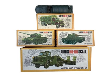 Lot 1906 - Airfix HO-OO Scale military vehicles including Antar Tank Transporter #1772, Patton Tank # 1653 (x2), 6 x 6 Truck #1655, all boxed and Duck (loose) (5)