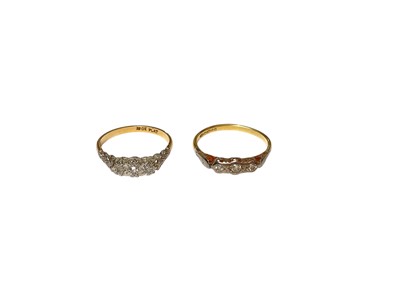 Lot 142 - Two 18ct gold diamond three stone rings in platinum illusion settings