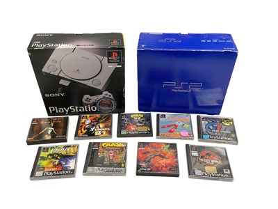 Lot 2712 - Boxed PlayStation 1 with controller and games, together with a boxed PlayStation 2 with controller.