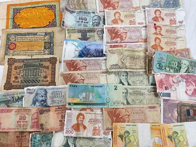 Lot 553 - World - Mixed banknotes taken from circulation to include redeemable currency notes (Qty)