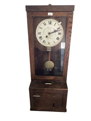 Lot 3017 - The Gledhill-Brook Time Recorders Ltd oak-cased wall-mounted clocking in clock, 104.5cm high50