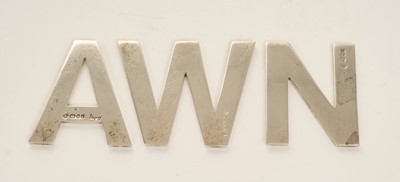 Lot 232 - Three Asprey paperweights in the form of letters A N W