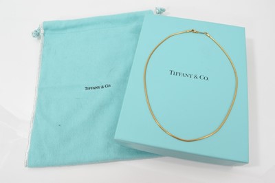 Lot 496 - Tiffany & Co 18ct gold necklace in original box
