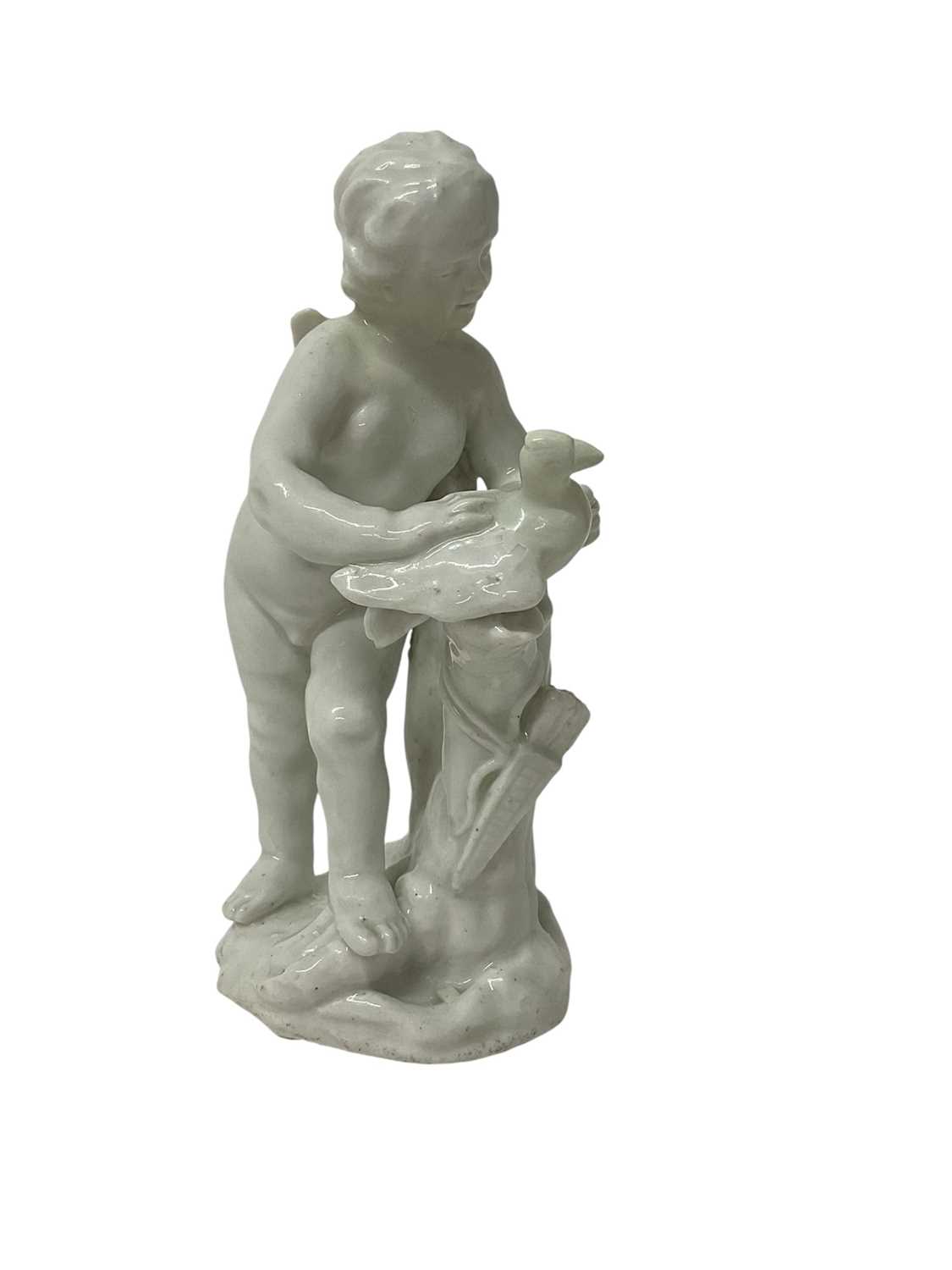 Lot 5010 - White glazed figure of Cupid