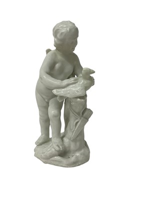 Lot 5010 - White glazed figure of Cupid