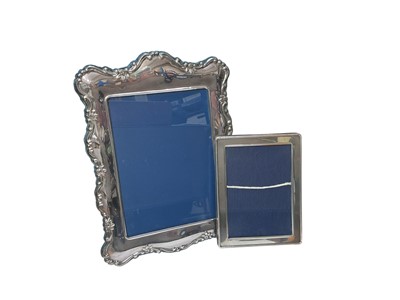 Lot 94 - Contemporary silver photograph frame, together with a silver plated frame (2)