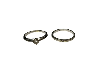 Lot 115 - 9ct white gold diamond single stone ring and 9ct white gold diamond set eternity ring (2)
