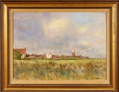 Lot 1206 - Owen Waters (1916-2004) oil on board - Cley Village from the Coast Road, signed, titled verso, 30cm x 41cm, in gilt frame