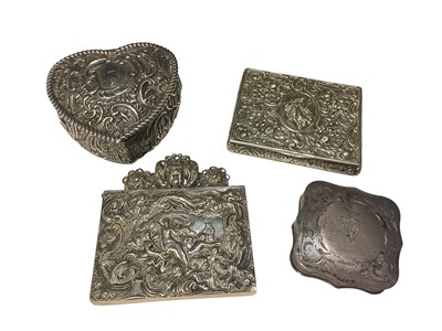 Lot 202 - Victorian silver heart shaped trinket box, white metal square shaped box, continental silver (800) card case with embossed figure and scroll decoration and a similar white metal box (4)
