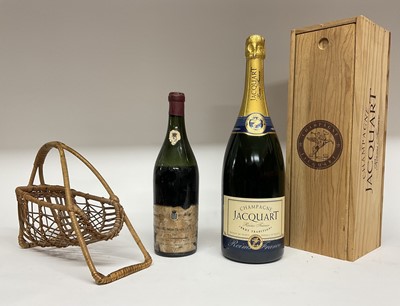 Lot 76 - Magnum of Jacquart champagne in original wooden case and a bottle of Chassagne Montrachet 1949, in wicker carrier (2 bottles)