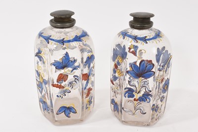 Lot 63 - Pair of 18th century German 'Stiegel-type' glass bottles with hand painted polychrome enamelled floral decoration and original pewter mounts