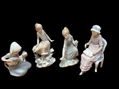 Lot 2231 - Four Lladro porcelain figures including seated girl reading and girl picking flowers