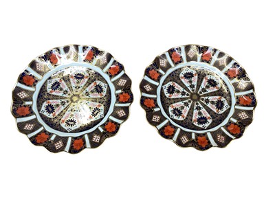 Lot 2232 - Pair of Royal Crown Derby Imari fluted plates, pattern 1128, 21cm diameter