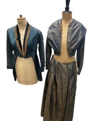 Lot 2540 - Group of Victorian and later costumes, including a blue silk skirt with matching bodice, a blue jacket with corded trim and cropped front, a black velvet evening cape by Samaritaine Paris, a blac...