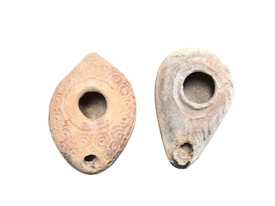 Lot 2995 - Two Roman pottery oil lamps