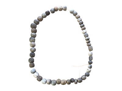 Lot 2991 - Mammoth bone necklace, 31cm