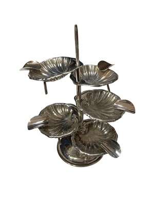 Lot 266 - Mexican sterling silver ash tray tree, with five individual silver shell shaped ashtrays, on central support, stamped Sterling 925, 15cm in overall height.
