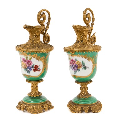 Lot 81 - Pair of Sèvres-style gilt metal mounted small ewers