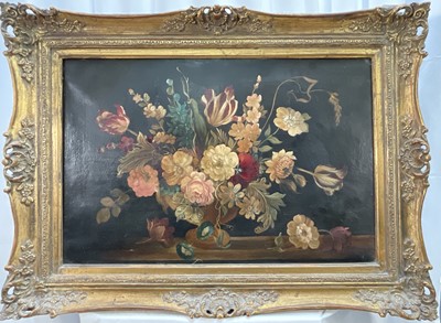 Lot 389 - Late Victorian/Edwardian oil on canvas - Still Life Profusion of Flowers, 51cm x 76cm, in gilt frame