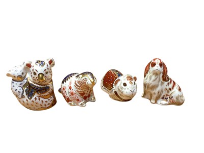 Lot 2252 - Four Royal Crown Derby paperweights - Koala & Baby, Beaver, Guinea Pig and Cavalier King Charles Spaniel, all boxed