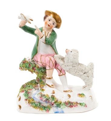 Lot 70 - Staffordshire porcelain group of a young boy with a poodle, circa 1840-50. See D G Rice, Dogs in English Porcelain of the 19th Century, colour plate 75, for a similar group