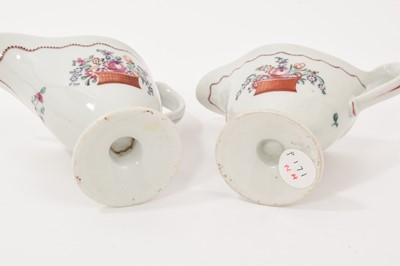 Lot 5008 - Two New Hall ‘clip handled’ helmet shaped milk jugs, circa 1785-90