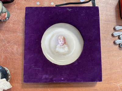 Lot 5072 - 19th century porcelain plaque, painted with a child, in velvet frame